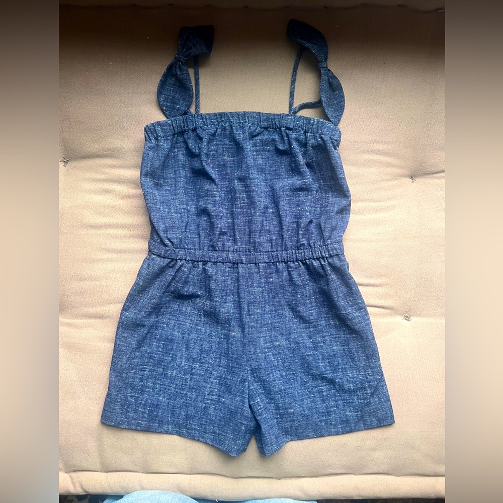 Cute lightweight jumper/romper, never worn, new with tags.